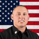 Portrait of Fire Marshall Joe Cavin with United States Flag in the Background